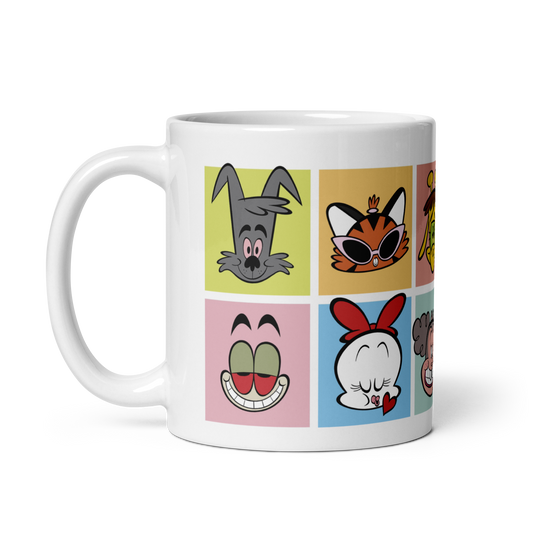 White glossy mug with cartoon character faces, 11 oz, handle on left.