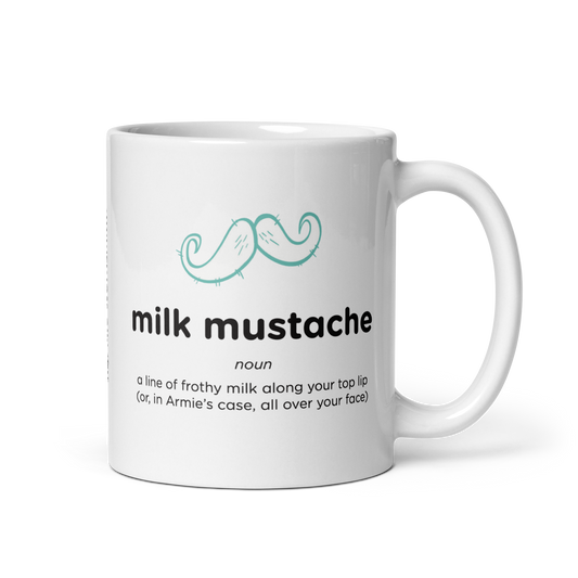 White glossy mug with milk mustache design, handle on right.