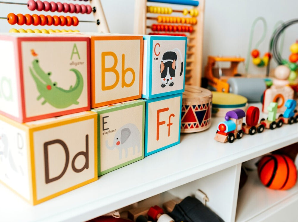 a set of the best educational toys for kids in preschool on a shelf at home