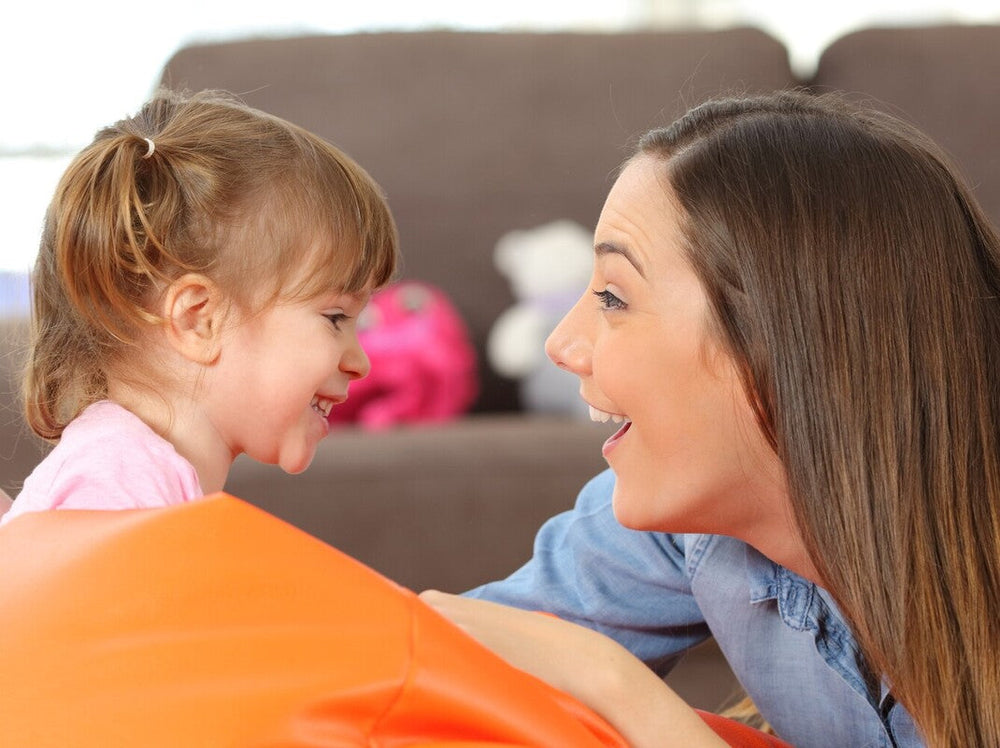 mom talking to her daughter, showing when kids start listening